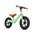 Bicicleta sin pedales ajustable de Tinyki, perfecta para niños en crecimiento. Mejora el equilibrio y la coordinación. Verde